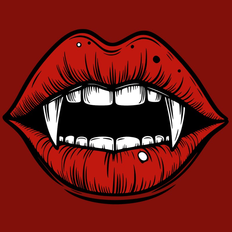 lips with vampire teeth