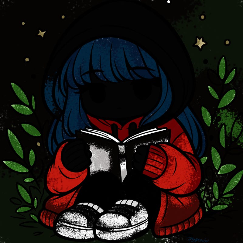 girl in oversized hoodie reading a book