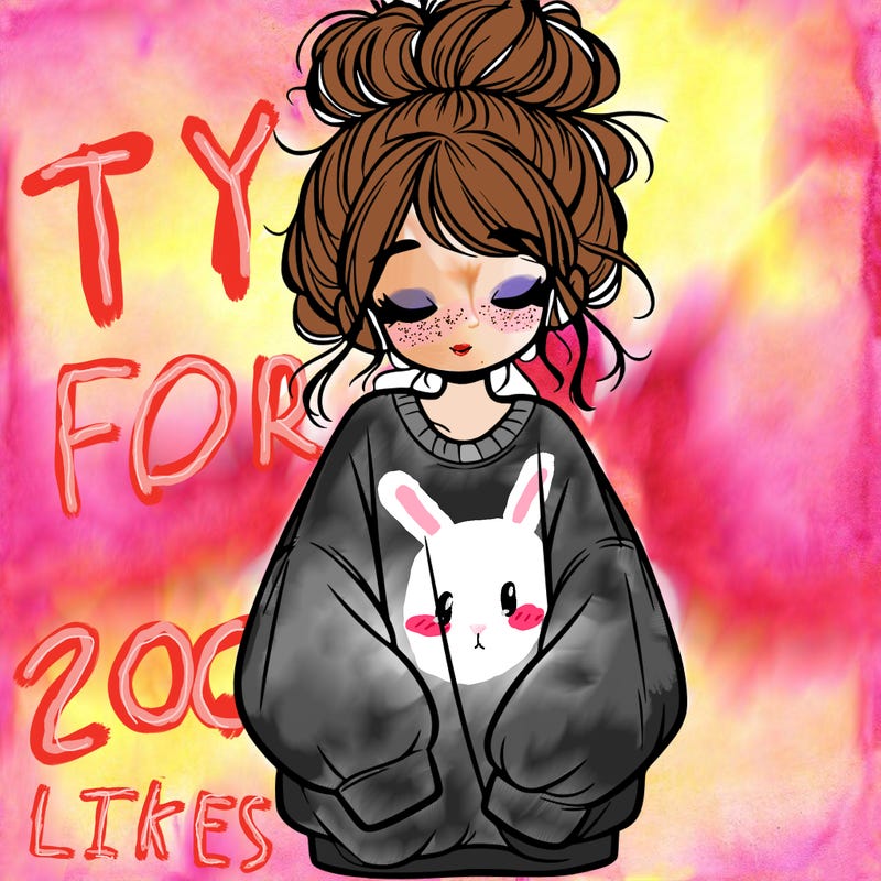 girl with baggy sweatshirt and messy bun