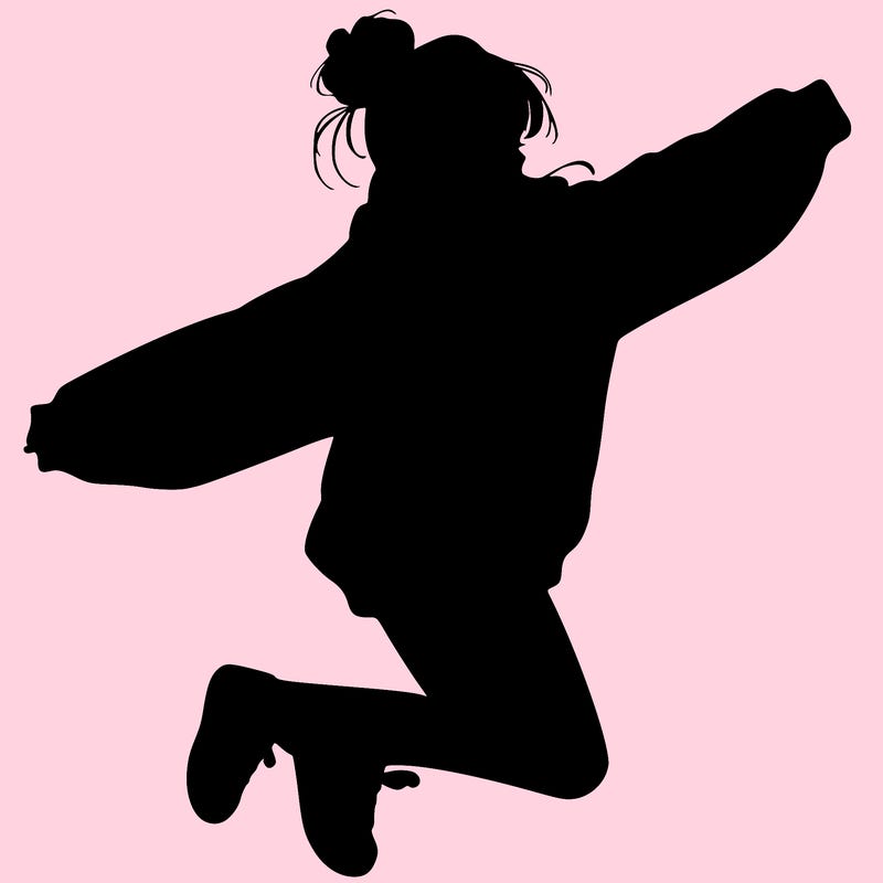 realistic girl jumping with a bun and oversized sweatshirt