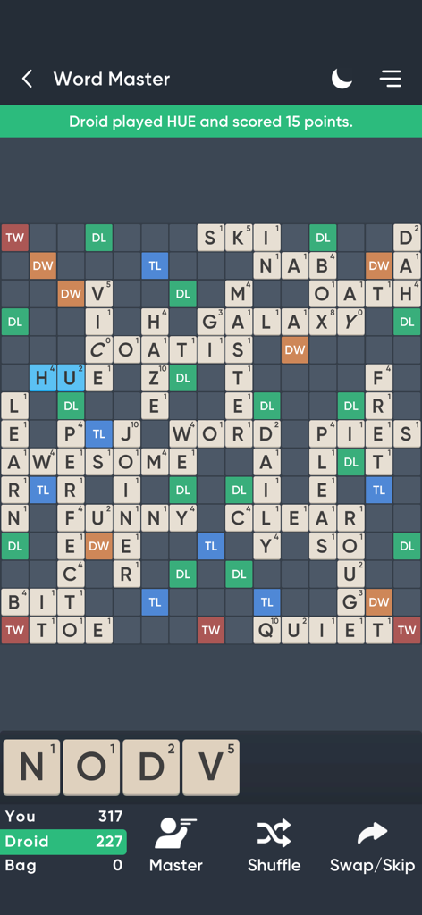 Gameplay screen of Word Master Pro featuring a crossword board and letter tiles in night mode