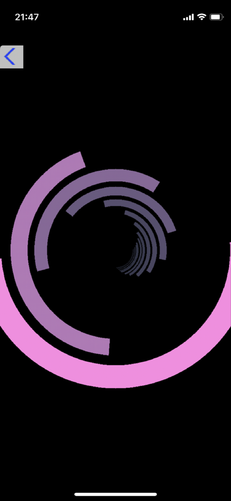 Uma demonstração de gráficos 2D no aplicativo BBCBasic com um padrão espiral roxo em um fundo preto.