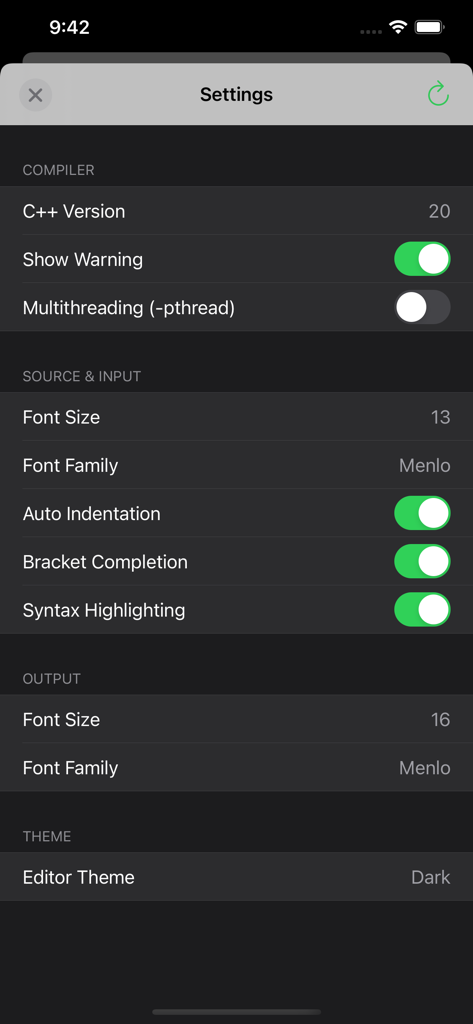 Settings screen of the C C++ Programming Compiler app showing options for compiler version source editor font and dark theme
