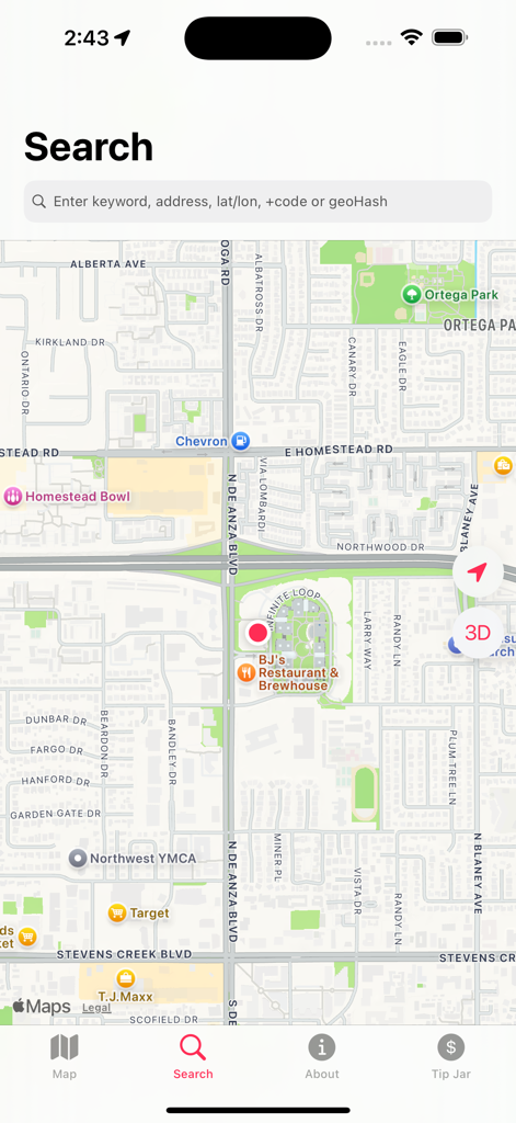 The Location App - Search screen of The Location App showing a map view with a pin on a location and a search bar for addresses and coordinates