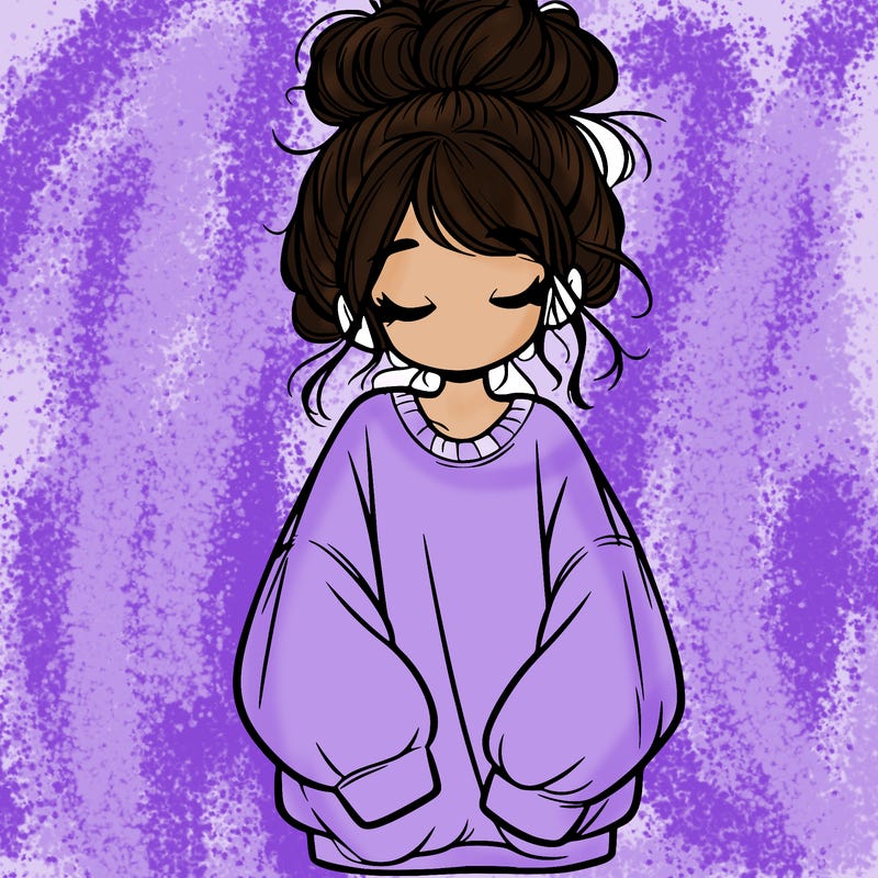girl with baggy sweatshirt and messy bun