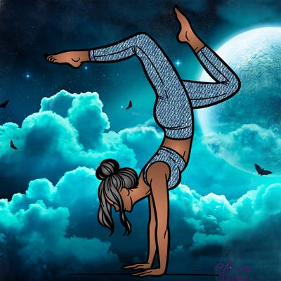 a woman doing a handstand