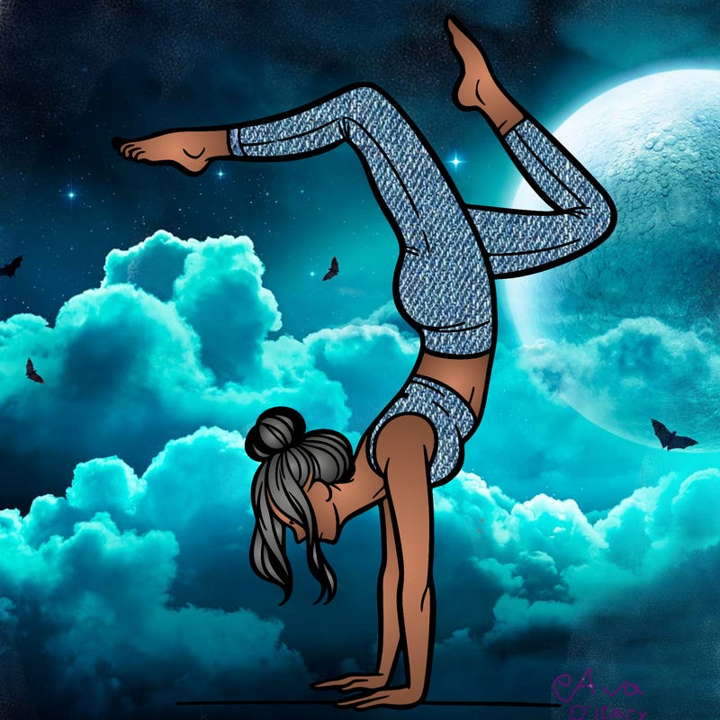 a woman doing a handstand