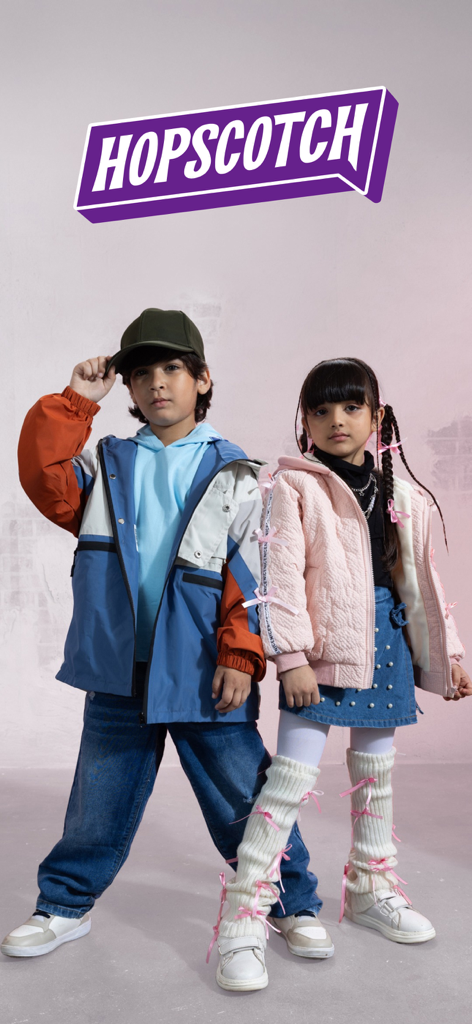 A young boy and girl modeling stylish and trendy outfits from the Hopscotch kids fashion brand