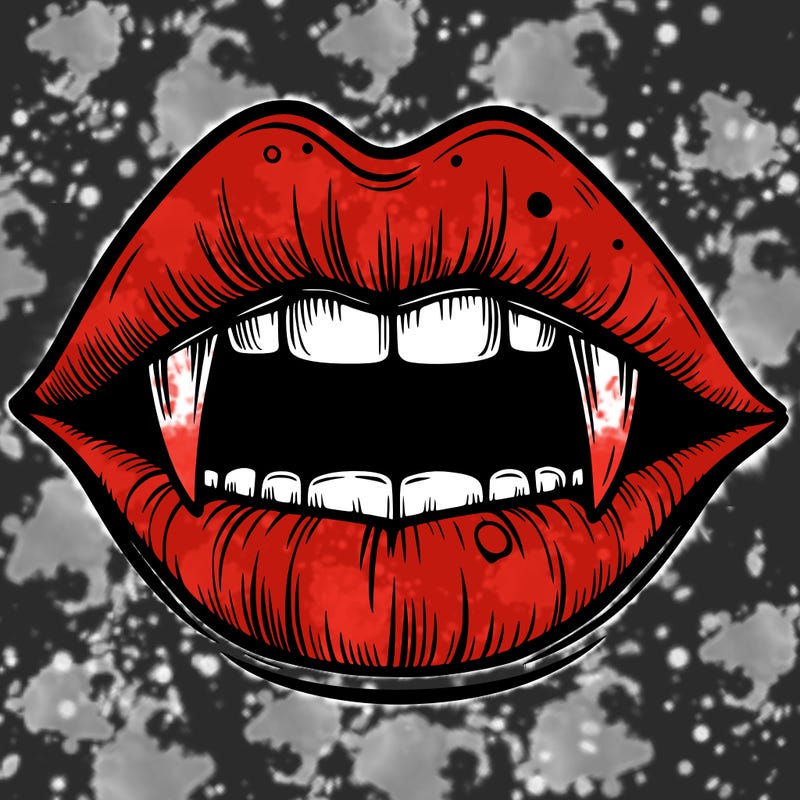 lips with vampire teeth
