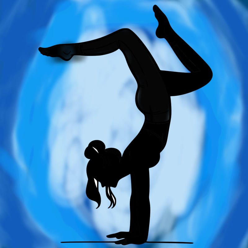 a woman doing a handstand
