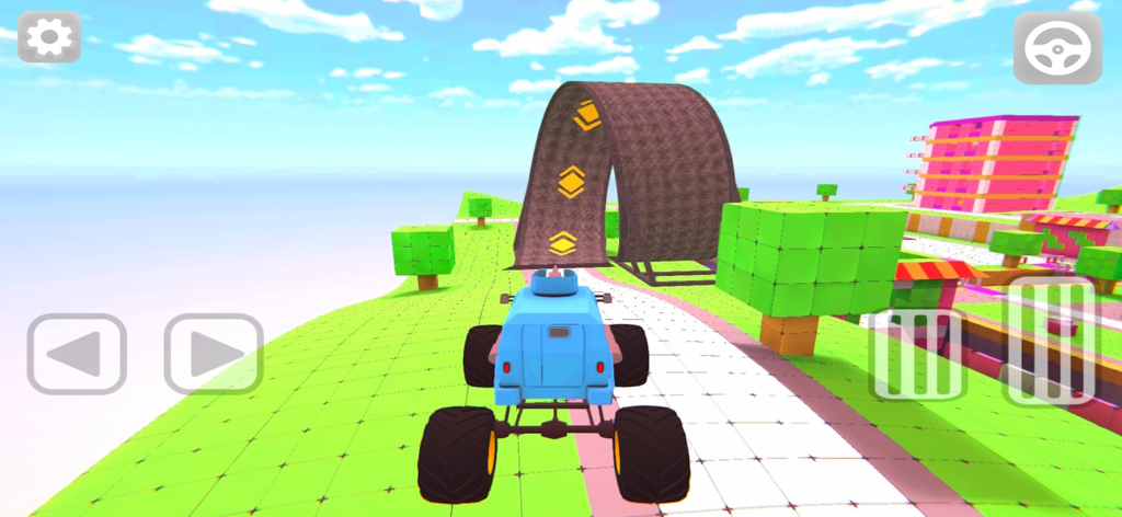 Blue monster truck approaching a curved stunt ramp in a 3D blocky world.