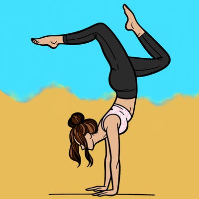 a woman doing a handstand