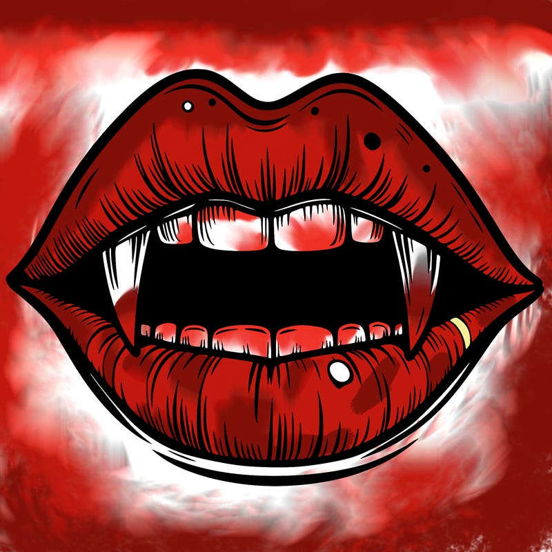 lips with vampire teeth