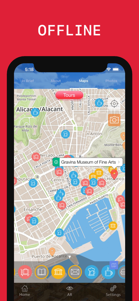 Alicante Travel Guide app displaying an offline city map with points of interest markers and navigation options