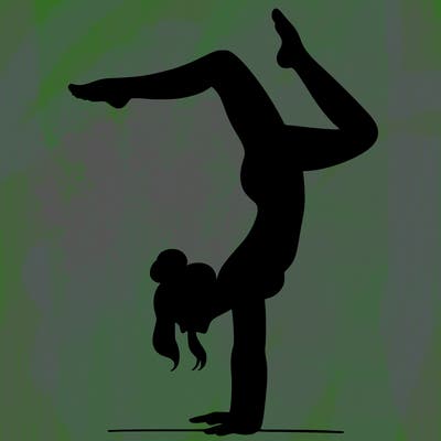 a woman doing a handstand