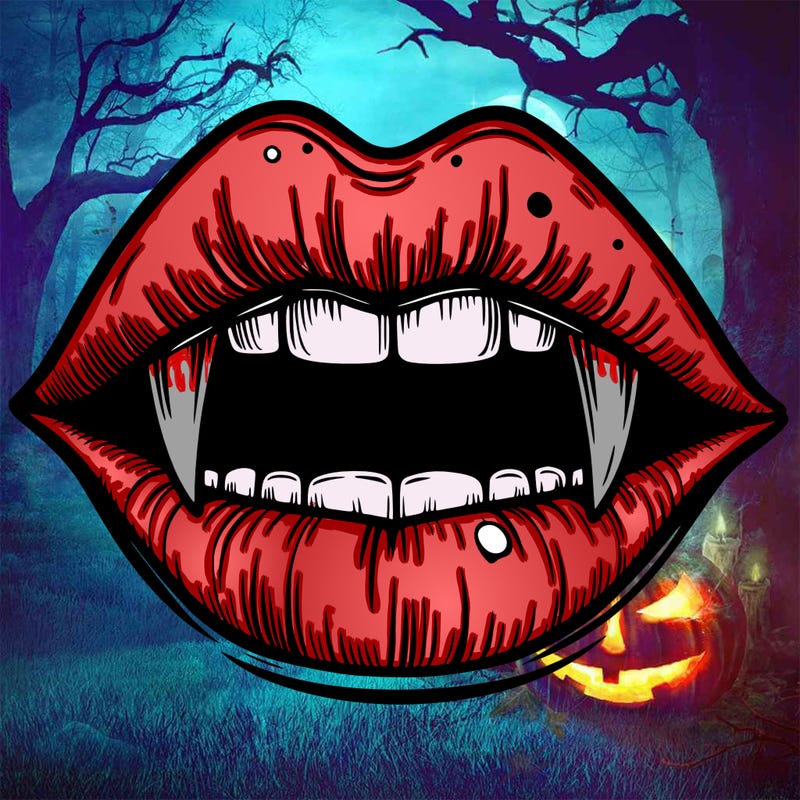 lips with vampire teeth