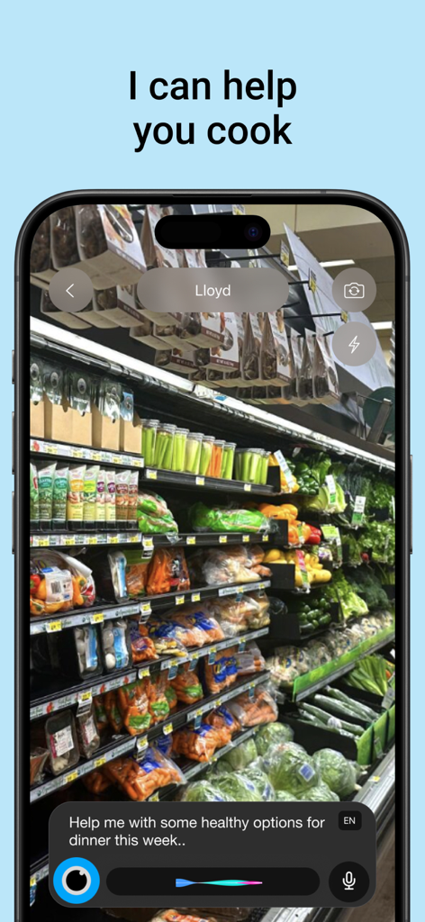 Lloyd - Your AI Superpower - Interfaz de la aplicación Lloyd AI que muestra el pasillo de frutas y verduras de un supermercado con una solicitud de sugerencias de cenas saludables.