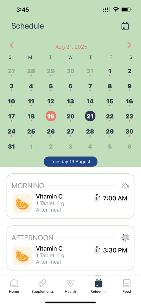 SupplementMD app interface showing a monthly calendar and a daily vitamin C schedule