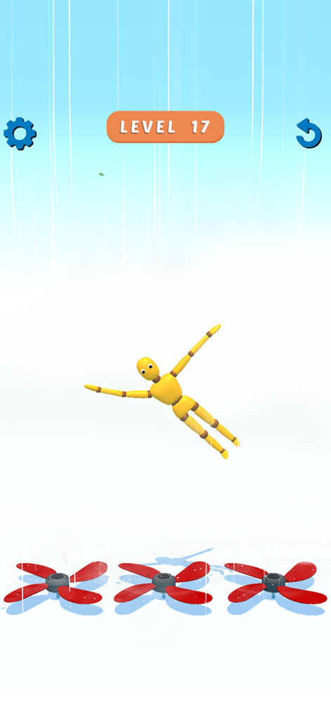 Ragdoll Games: Breaking Bones - Un muñeco amarillo cayendo del cielo hacia tres hélices rojas giratorias en el Nivel 17 de Ragdoll Games.