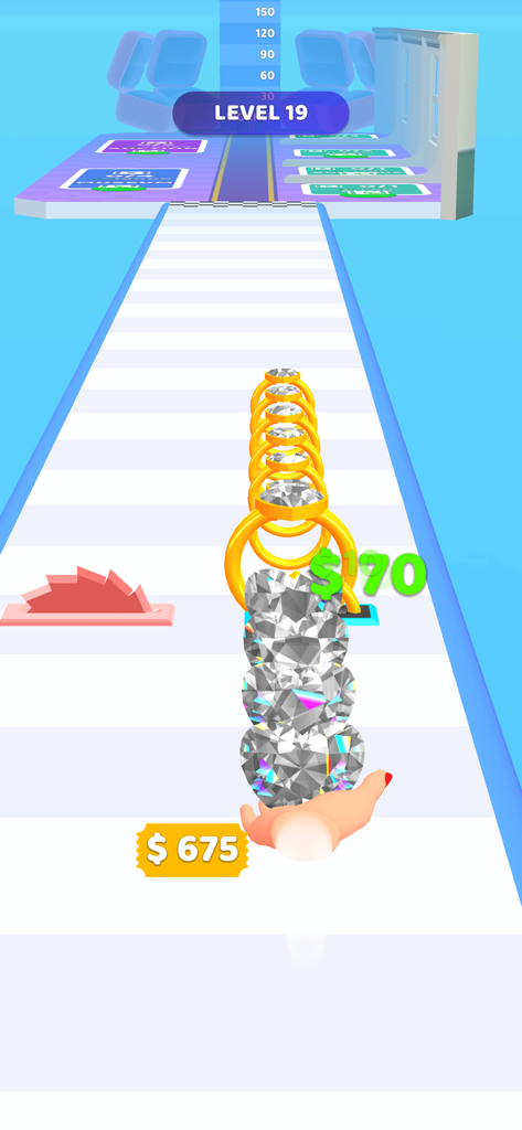 Gem Stack - Hand holding a stack of diamonds passing through gold rings in Gem Stack game