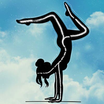 a woman doing a handstand