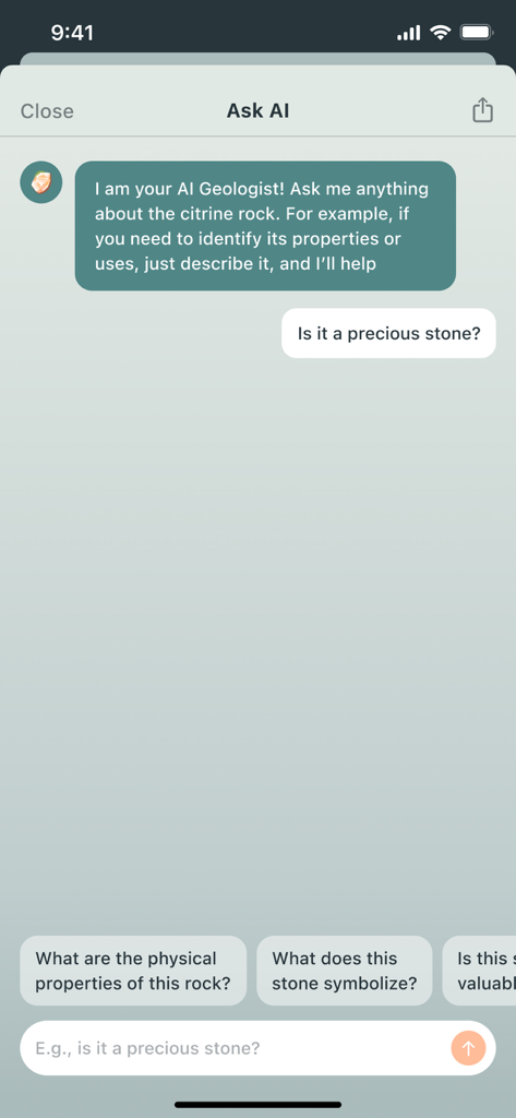 RockLens - Stone & Gemstone ID - Chat interface of the RockLens app showing an AI geologist answering a question about citrine properties