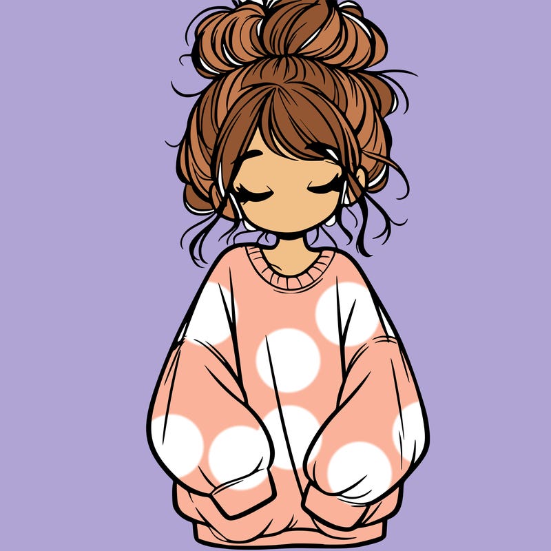 girl with baggy sweatshirt and messy bun