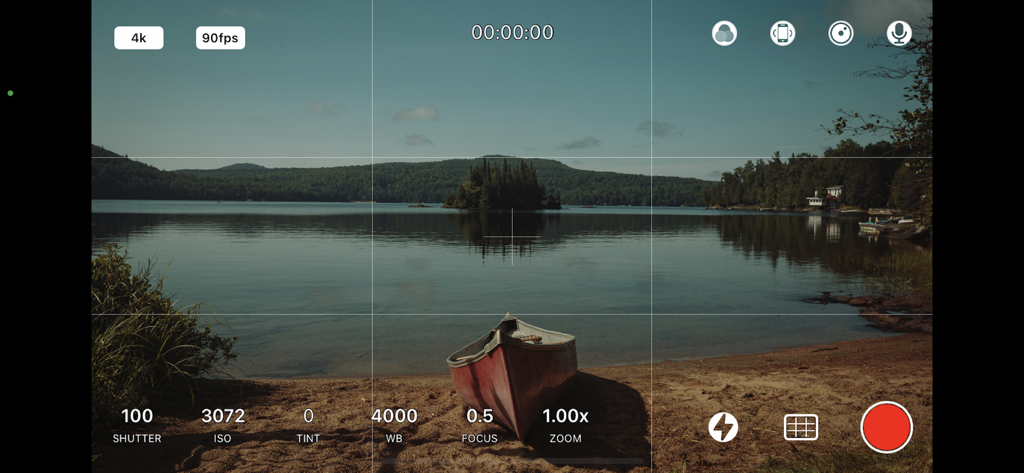 ProCam app interface showing manual video controls for shutter ISO focus and 4K recording over a scenic lake