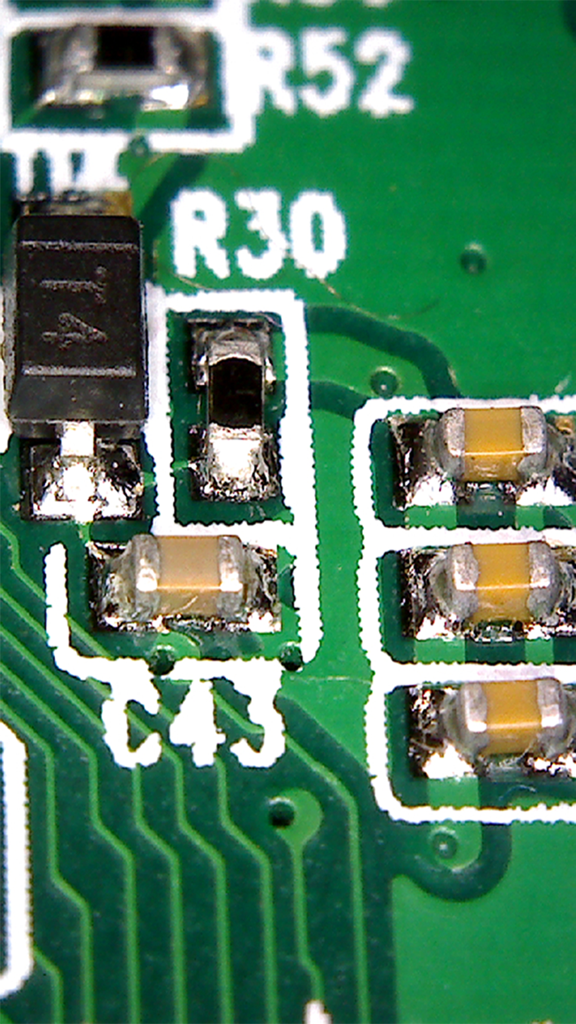 Hotviewer（WIFI Microscope） - Macro view of a green circuit board with surface-mount electronic components captured by a Wi-Fi microscope.