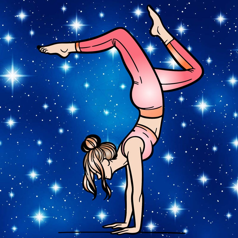 a woman doing a handstand