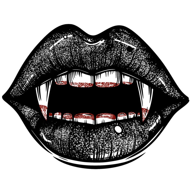 lips with vampire teeth