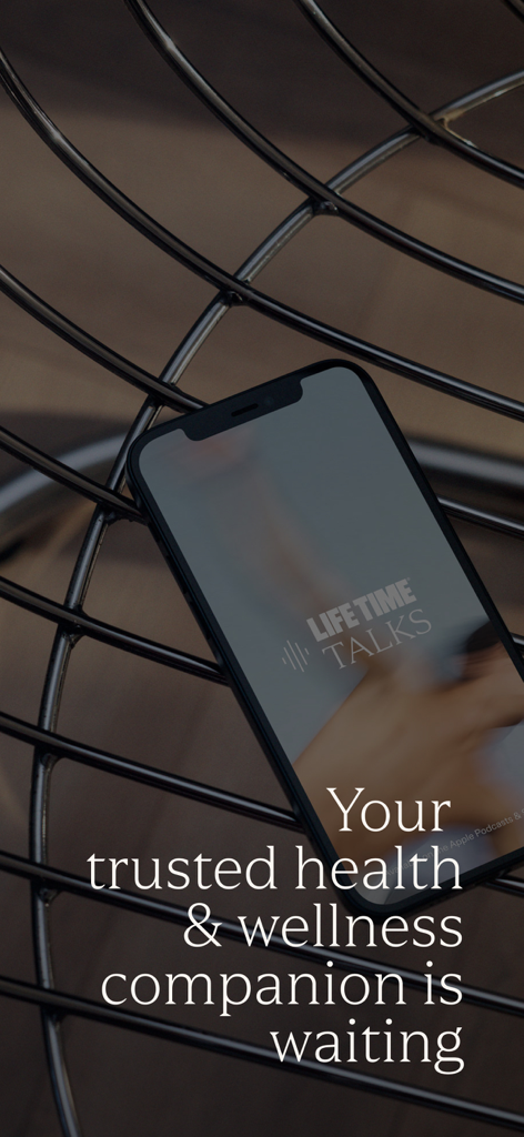 Life Time Digital app screen on a smartphone featuring Life Time Talks and wellness companion text