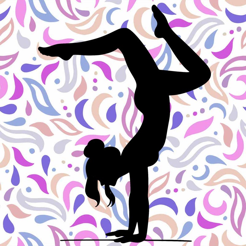 a woman doing a handstand