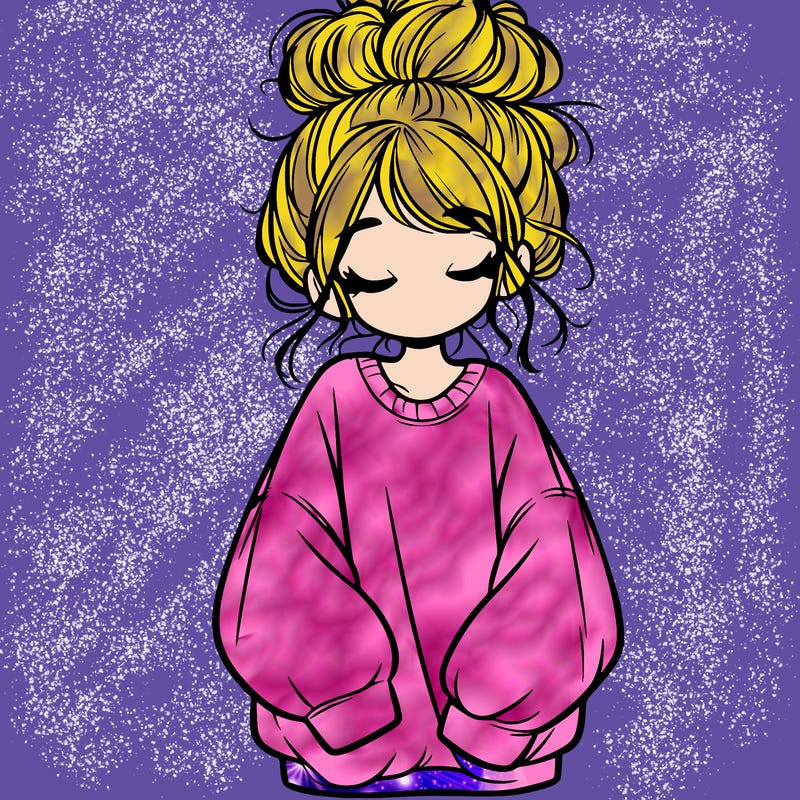 girl with baggy sweatshirt and messy bun