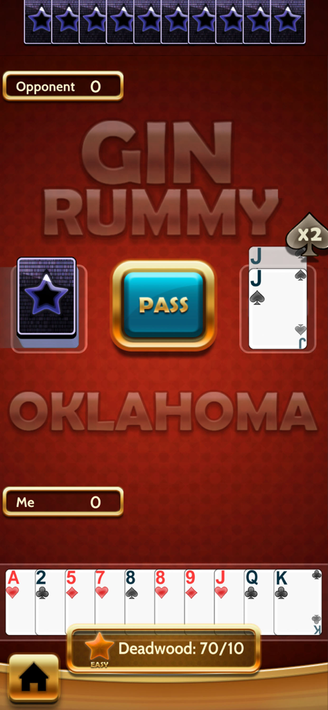 Una captura de pantalla del juego de la aplicación móvil Gin Rummy Classic mostrando el modo de juego de cartas Oklahoma con la mano del jugador y el botón de pasar