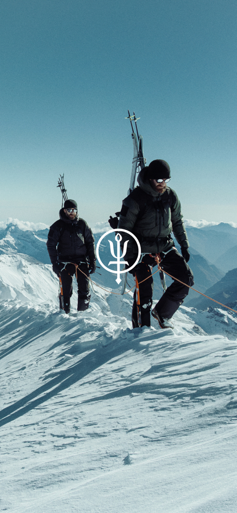 ThruDark - Two mountaineers climbing a snowy ridge wearing ThruDark technical gear.