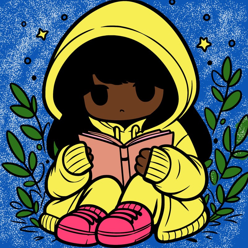 girl in oversized hoodie reading a book