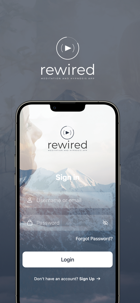Rewired App - Login screen of the Rewired meditation and hypnosis app showing sign in fields over a mountain landscape background.