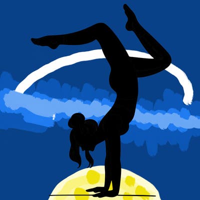a woman doing a handstand