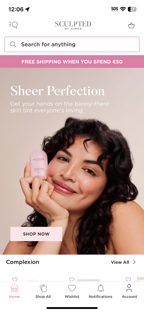 Sculpted By Aimee - Schermata principale dell'app Sculpted by Aimee con una promozione HydraTint skin tint e un pulsante 'Acquista ora'