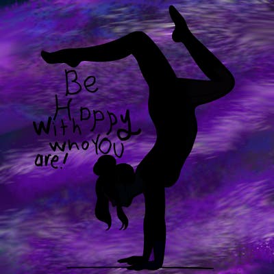 a woman doing a handstand