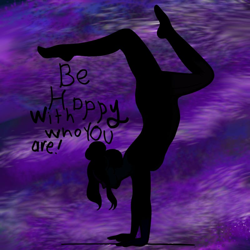 a woman doing a handstand