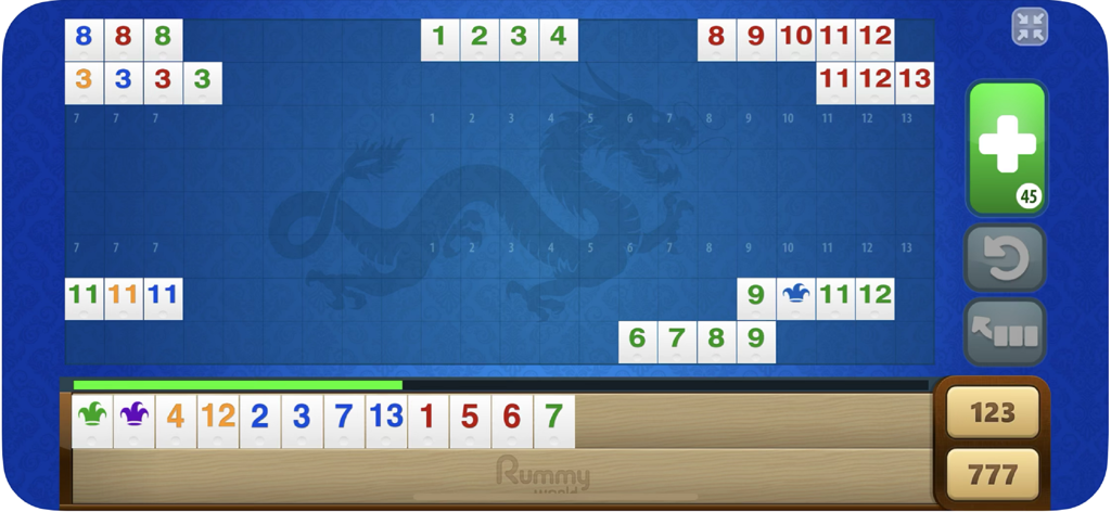 Rummy World - A gameplay screenshot of Rummy World showing tiles arranged in sets and runs on a blue board.