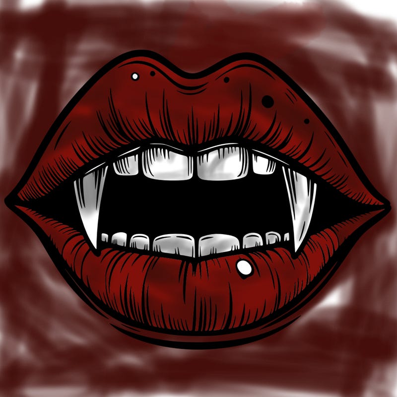 lips with vampire teeth