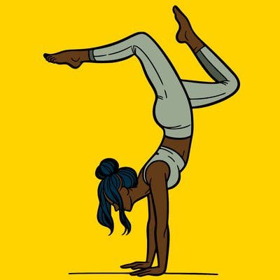 a woman doing a handstand