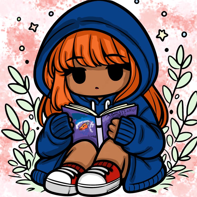 girl in oversized hoodie reading a book