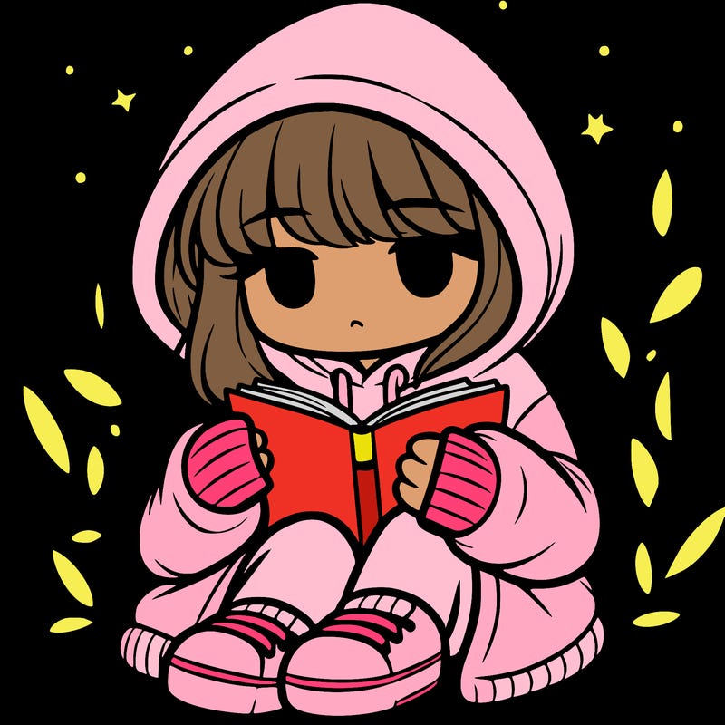 girl in oversized hoodie reading a book