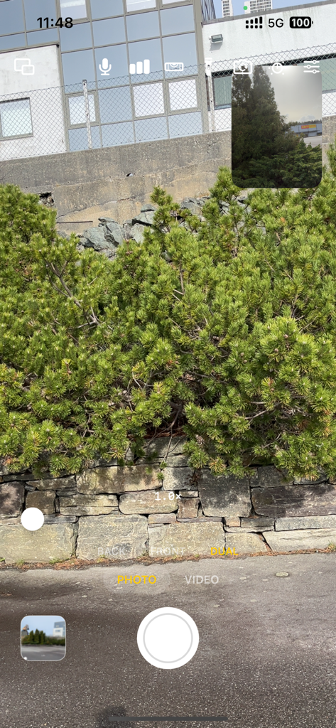 Camera – Dual Photo - Smartphone interface showing dual camera photo mode with a picture-in-picture view of two camera angles simultaneously.