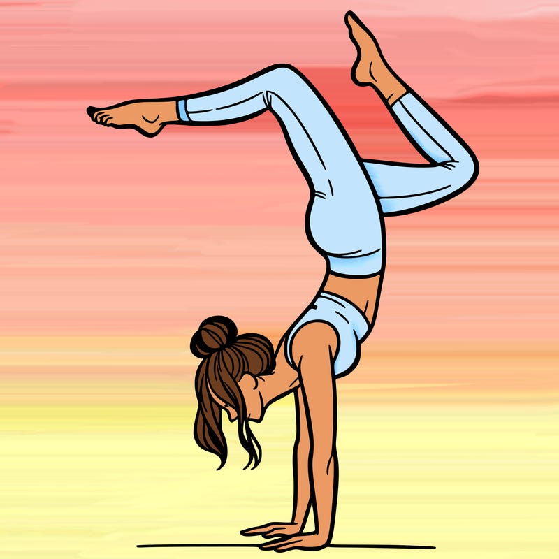 a woman doing a handstand