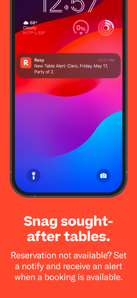Resy - iPhone lock screen showing a Resy app notification for a new table alert at a restaurant